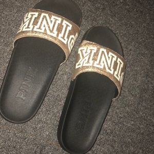 Pink slides, worn once